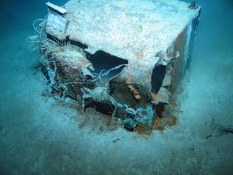 Rectangular tank or locker on seabed